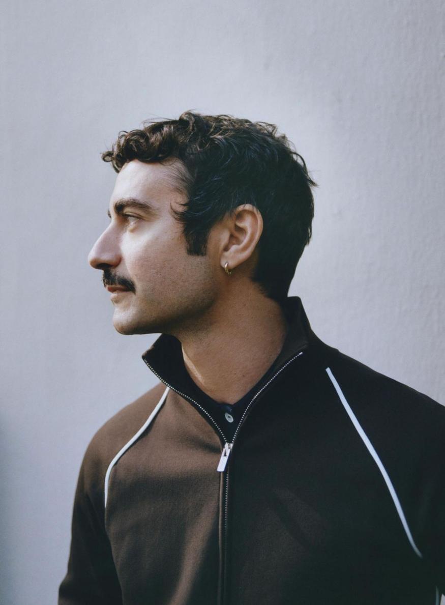 dario vitale depart versace prada group